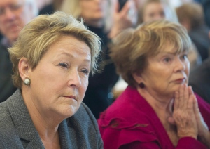 Parti Quebecois leader Pauline Marois, left, sits next to women's rights activist Janette Bertrand during a Quebec provincial election campaign stop at a restaurant in Laval, Que., Sunday March 30, 2014. THE CANADIAN PRESS/Graham Hughes