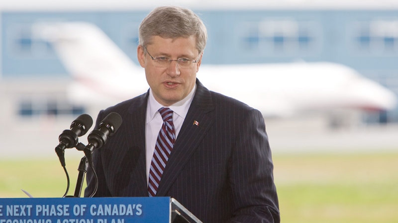 Prime Minister Stephen Harper speaks during a visit to the Peterborough Municipal Airport in Peterborough, Ont., on Friday, Oct. 14, 2011. Harper was at the airport to mark the completion of the airport expansion, partially funded by the federal and provincial governments, and a move which will see an increase in local employment as well as boosting the aviation facilities there. (THE CANADIAN PRESS/Peter Redman)