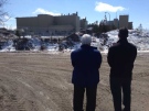 Rob Liddle and John Peevers stand in front of Bruce Power's B generating station near Tiverton, Ont. on Wednesday, April 2, 2014. (Scott Miller / CTV London)

