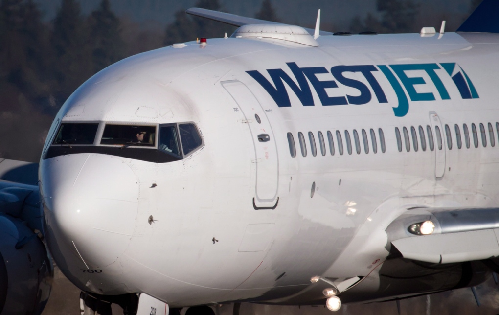 A WestJet flight arrives in Vancouver
