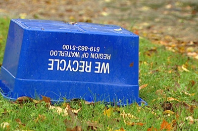 File photo of a blue box sitting on a lawn.