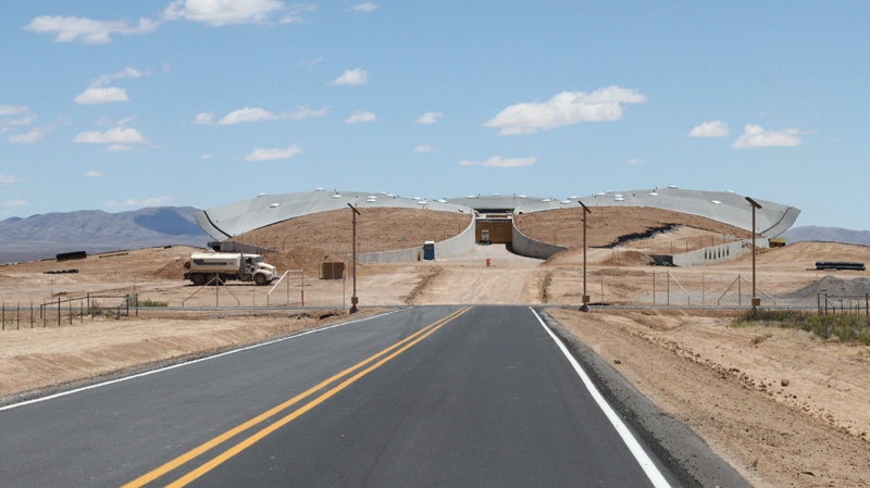 In this May 20, 2011 image, the roofline of Spaceport America blends into the landscape near Upham, N.M. (AP Photo/Susan Montoya Bryan)