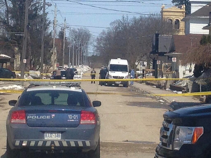 The scene of a murder is seen blocked by police tape in Hanover, Ont. on Sunday, March 6, 2014. (Mike Nowakowski)