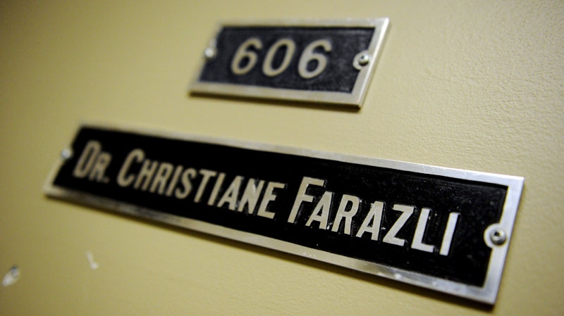 The door name and number for Dr.Christian Farazli's clinic in the Parkdale Medical Tower is shown in Ottawa on Monday, October 17, 2011. (Sean Kilpatrick / THE CANADIAN PRESS)