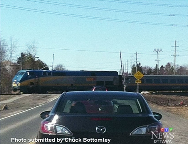 A photo of a Via Rail train passing through a level crossing without its barriers lowered in Ottawa has sparked anger on social media, but the crown corporation says at no time were drivers or pedestrians  at risk.