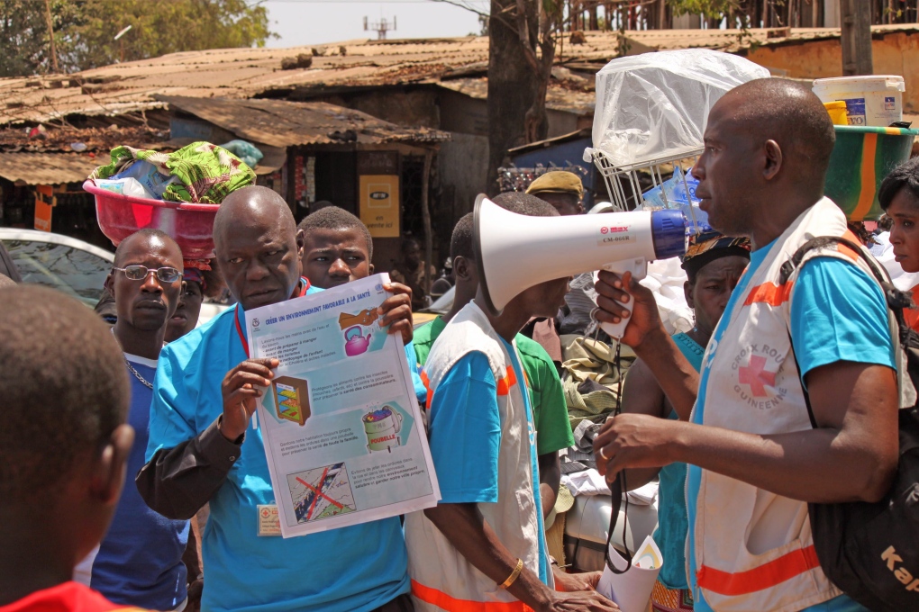 Health workers discuss Ebola in Guinea