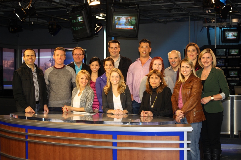 The members of the CTV London running team for the Forest City Road Races pose for a photo in studio.
