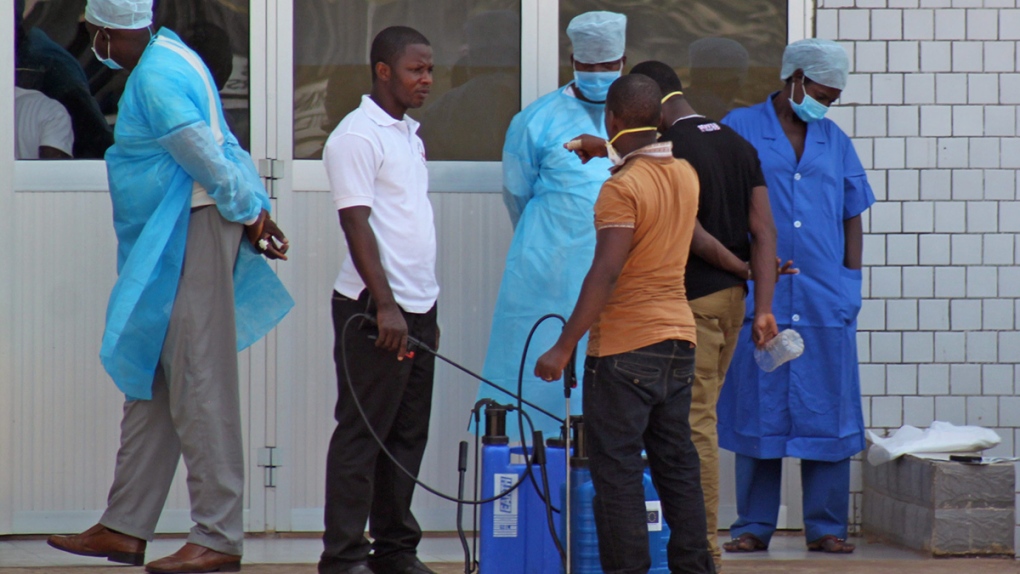 Personnel await potential ebola patients in Guinea