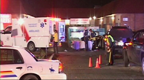 Mounties investigate the scene of a fatal shooting in Surrey, B.C. Oct. 23, 2011. (CTV)