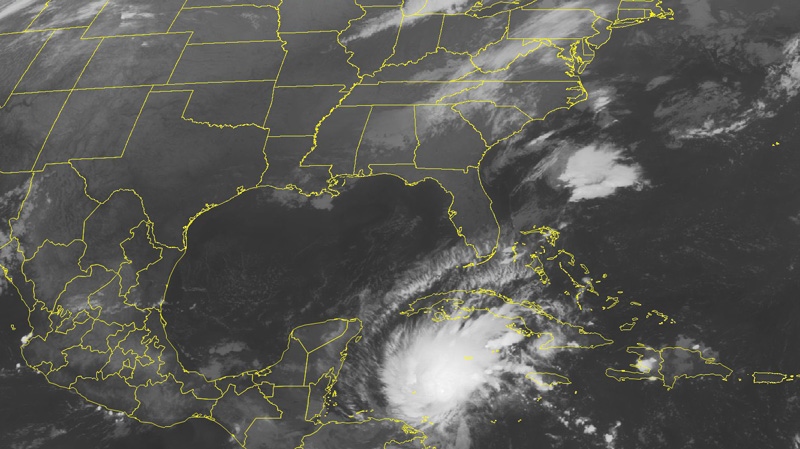 This NOAA satellite image taken Monday, Oct. 24, 2011 at 1:45 a.m. EDT shows Tropical Storm Rina located northeast of Cabo Gracias a Dios on the Nicaragua-Honduras border. (AP PHOTO/WEATHER UNDERGROUND)