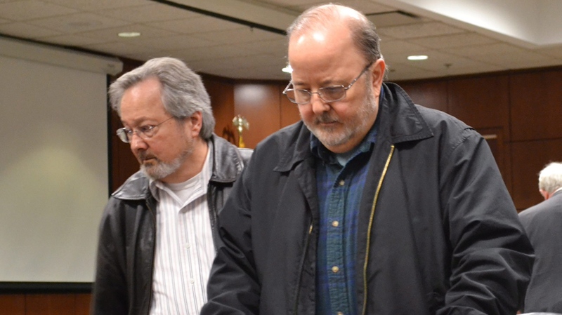 James Schook, right, in a Louisville, Ky., court