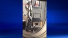 Abbotsford resident Dwayne Stewart records an Air Canada worker tossing baggage from the top of a movable stairway to a bin below before a flight from Toronto to Vancouver, Thursday, April 17, 2014.
