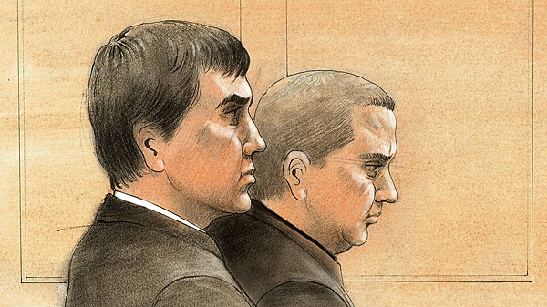 Dmitri Kossyrine (left) and Ivgeny Vorobiov, both 33, in a Toronto courtroom on Wednesday, Oct. 26, 2011.