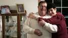 George Brzeczek and wife Carolyn, who met on the dating website FarmersOnly, are seen in their home, Friday, Jan. 18, 2008, in Helena, Ohio. (AP Photo/J.D. Pooley)