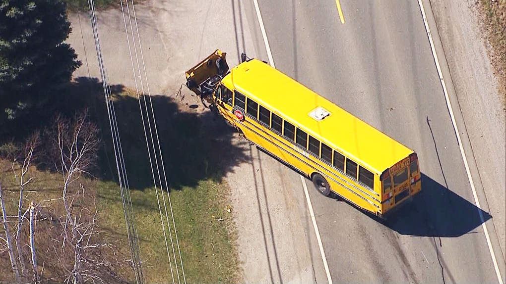 School bus collides with vehicle near Milton
