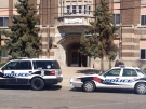 Windsor police vehicles can be seen outside of Walkerville Collegiate on Thursday, April 24, 2014, after a Tweet was sent out over Twitter. (Rich Garton/ CTV Windsor)