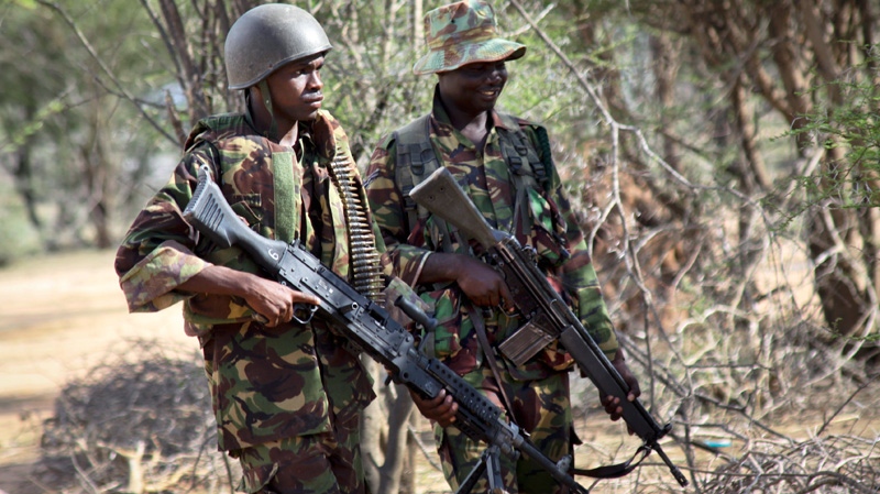 Kenyan military are seen near Liboi at the border with Somalia in Kenya, Tuesday, Oct. 18, 2011. (AP Photo)