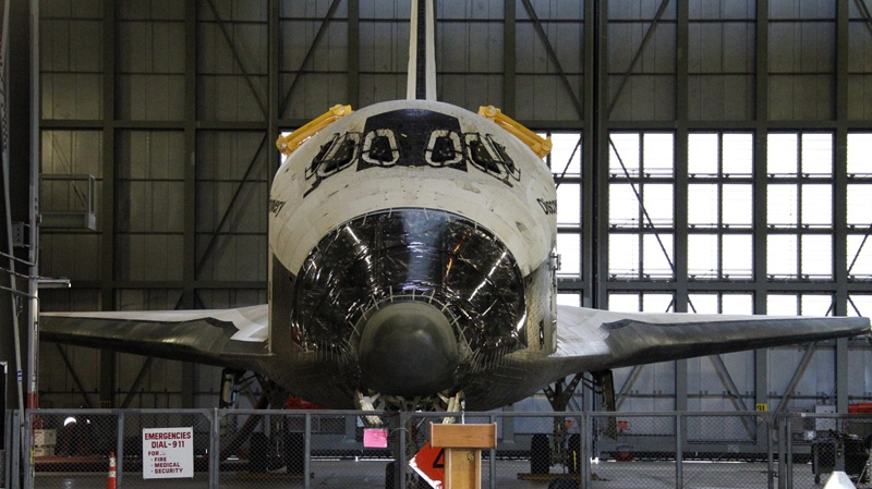 Space shuttle Discovery is parked inside the Vehicle Assembly Building at the Kennedy Space Center at Cape Canaveral, Fla., Thursday, July 21, 2011. (AP Photo/Terry Renna)