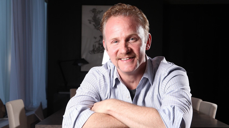 In this Sept. 11, 2011 photo, director Morgan Spurlock poses for a portrait during the 36th Toronto International Film Festival in Toronto, Canada. (AP / Carlo Allegri)
