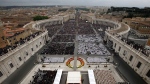 A view of St. Peter's Square filled with faithful during a solemn ceremony led by Pope Francis at the Vatican, Sunday, April 27, 2014.  (AP / Andrew Medichini)