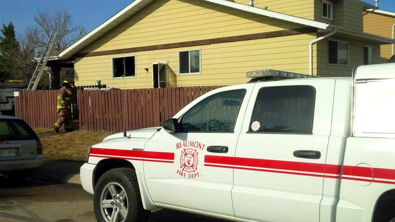 A Beaumont Fire Department vehicle parked near the site of a house fire Monday, April 28, 2014.