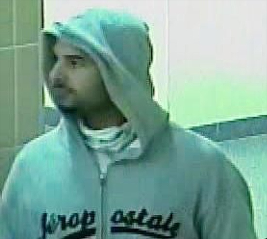 Toronto Police released this photo of an alleged bank robber on Thursday, Nov. 3, 2011.