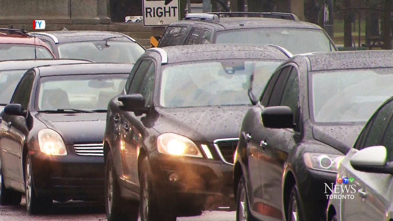 Toronto drivers wait in traffic during a busy morning commute on Tuesday, April 29, 2014.