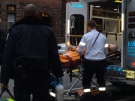 A male is seen being loaded into an ambulance after being stabbed multiple times at an address on Sherbourne Street on Tuesday, April 29, 2014. (CP24/Arda Zakarian) 
