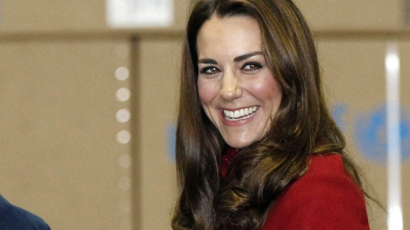 Britain's catherine Duchess of Cambridge smiles when she visited the UNICEF Supply Division Centre, Copenhagen Wednesday Nov. 2, 2011. (AP Photo/Phil Noble/PA)