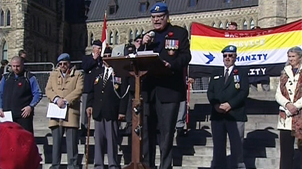 Canadian Veterans Advocacy president Michael Blais speaks at a rally protesting the cuts to Veterans Affairs on Parliament Hill in Ottawa on Saturday, Nov. 5, 2011.