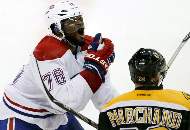 Montreal Canadiens defenseman P.K. Subban (76) reacts after getting hit in the face by Boston Bruins left wing Brad Marchand's stick during the second period of Game 1 in a second-round of a Stanley Cup playoff series in Boston, Thursday, May 1, 2014. (AP Photo/Charles Krupa)