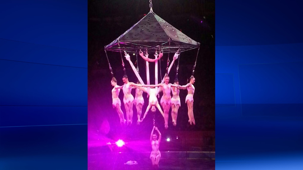 Circus aerial hair-hanging stunt