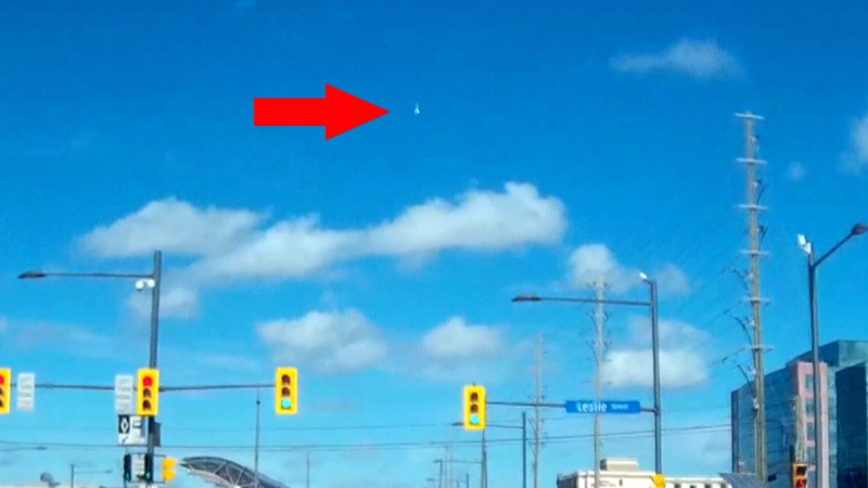 What is believed to be a meteor shoots across the sky, north of Toronto, Sunday, May 4, 2014. (ccinhk / YouTube)