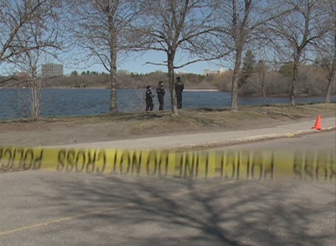 Regina police investigate a report of a vehicle in Wascana Lake on Wednesday.