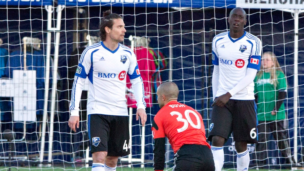 Montreal Impact's Heath Pearce (44), Evan Bush (30