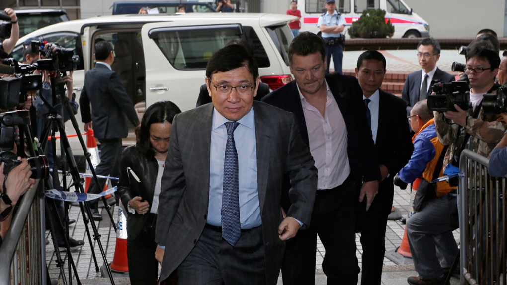 Raymond Kwok arrives at court in Hong Kong