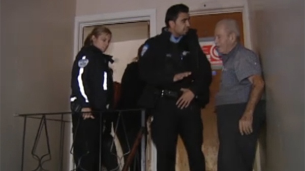 Police officers were on hand to keep the peace as the city removed tenants from an unsafe building. Landlord Claudio Di Giambattista was very angry at the city's decision. (Nov. 10, 2011)