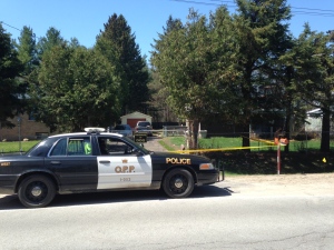 Police have a house on Baldwick Lane taped off on Sunday May 11, 2014 after a man was stabbed. (Steve Mansbridge / CTV Barrie)