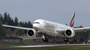 Boeing Co. 777, owned by Emirates, makes a landing in Everett, Wash.