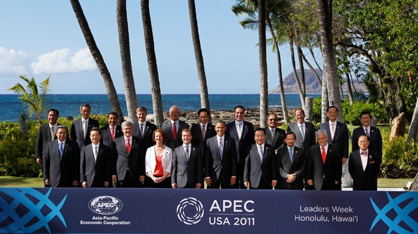 APEC leaders pose for the official photo during the Asia-Pacific Economic Cooperation summit in Kapolei, Hawaii, Sunday, Nov. 13, 2011. (AP / Chris Carlson)