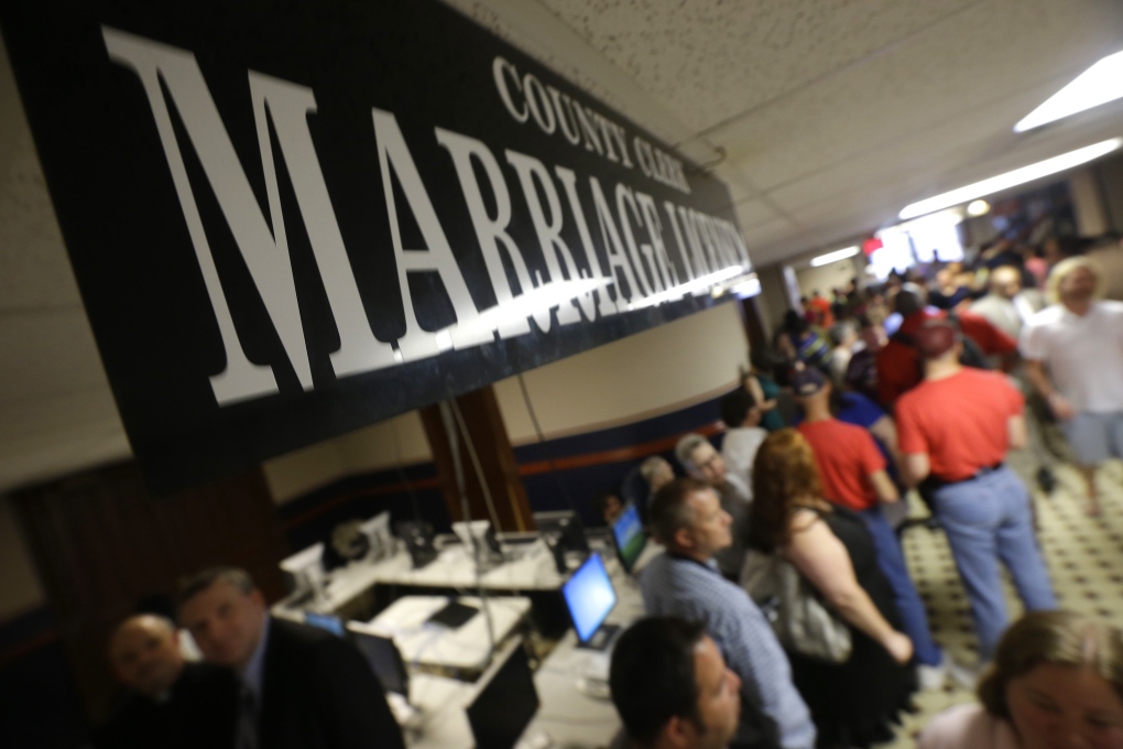 Arkansas gay couples line up for marriage licenses