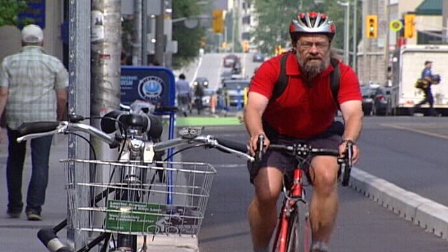 A cyclist along Laurier Avenue West.