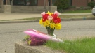 Flowers mark the spot where nine-year-old Ainsley Swance was killed on Main Street in Otterville, Ont.
