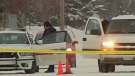 Police are seen here on the scene of a November 2011 death in Prince Albert.