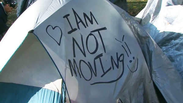 A message is scrawled on an Occupy Toronto tent at St. James Park, Tuesday, Nov. 15, 2011.