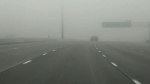 Thick fog causes poor visibility on Highway 401 in Toronto in this file photo.