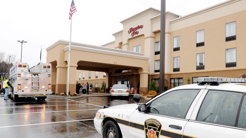 State Police in Indiana, Pa., arrest a suspect in connection with the White House shooting, at the Hampton Inn along Indian Springs Road in Indiana, Pa., Wednesday, Nov. 16. 2011. Oscar Ramiro Ortega-Hernandez, 21, was arrested without incident, according to police. (AP / The Indian Gazette, Tom Peel)