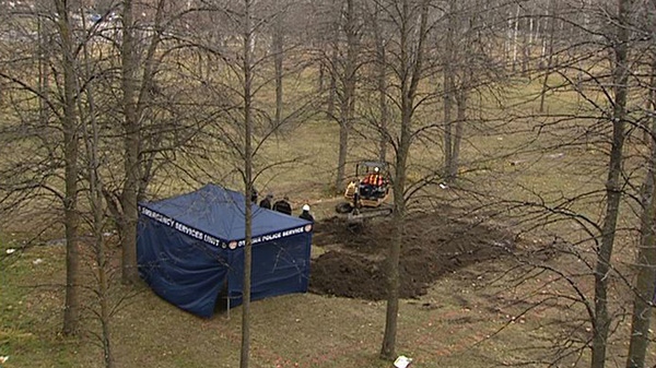 Police search Heatherington Road park in connection with human remains found nearby on Wednesday, Nov. 16, 2011.