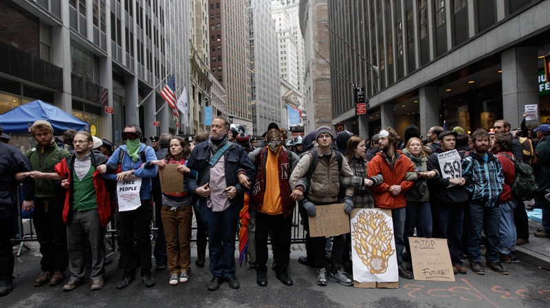 Occupy demonstrators march through NYC financial distric