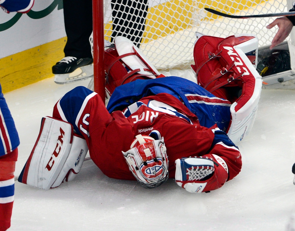 Carey Price lies on the ice in Montreal